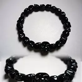 新品　ブラックオニキス スケルトン（髑髏彫り）腕輪　ブレスレット　桐箱付き 腕輪・ブレスレットの通販｜ドクロ彫で選ぶ - 数珠専門店 香源